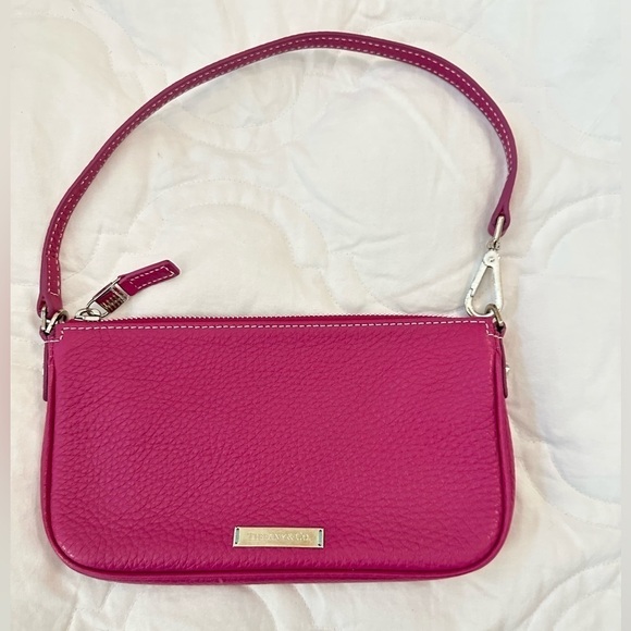 Tiffany & Co. Handbags - Tiffany & Co leather pochette wristlet mini bag pink raspberry